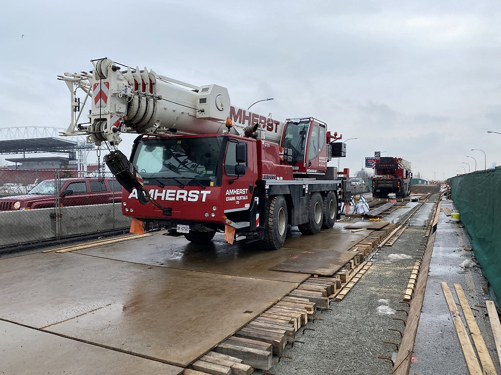Heavy construction vehicles on the Gardiner Expressway.
