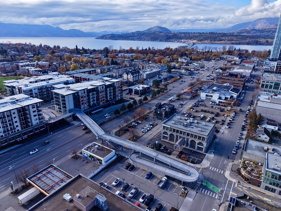 Bird's eye view of the completed bridge spanning the city.