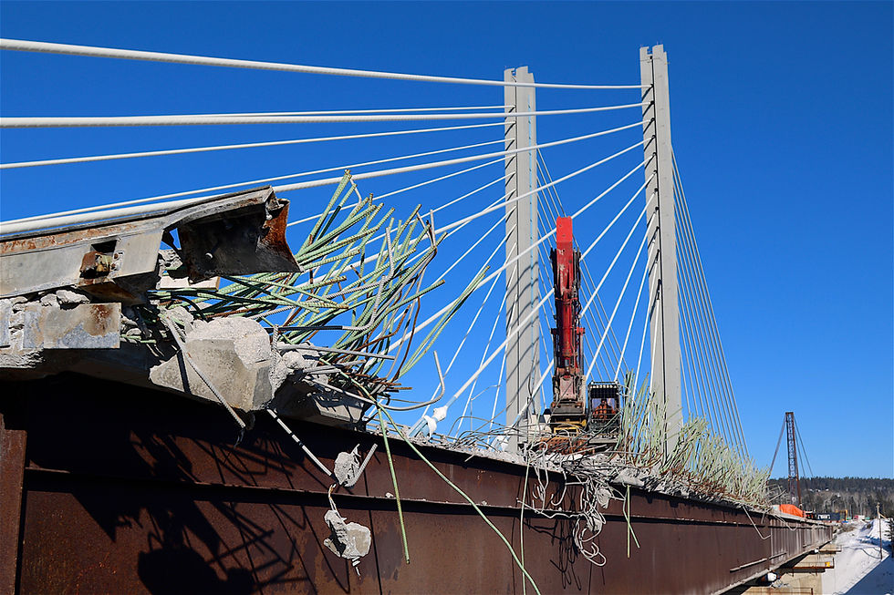 View at West Abutment of Excavator on Deck Breaking Concrete